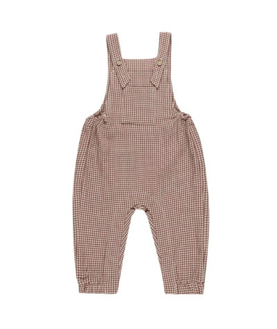 Baby overalls featuring adjustable straps with coconut buttons, open bib pocket, and metal buttons at the sides. Snaps along leg inseam make for easy changing.  *Size 2-3y does not have snaps at the inseam.  Featuring our ‘plum gingham' all over pattern.  Care: Machine wash cold. Tumble dry low. Minor shrinkage may occur if tumble dried.  Made of 100% Organic Cotton Quincy Mae Fall 24 Hello Baby