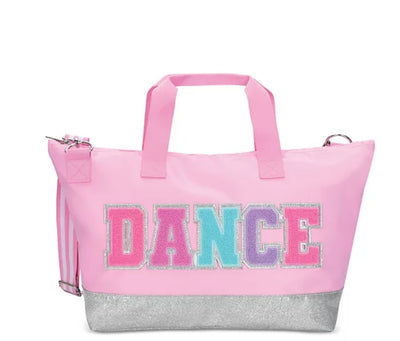 Get ready to dance the night away with the Iscream Dance Overnight Bag! This stylish bag features fun patches and is perfect for overnight trips or carrying all your dance essentials back and forth. With this bag by your side, you'll be ready to groove anytime, anywhere!  Double top handles, 4" drop Removable shoulder strap, 28" drop Zip closure Chenille glitter patches Lined Hello Baby